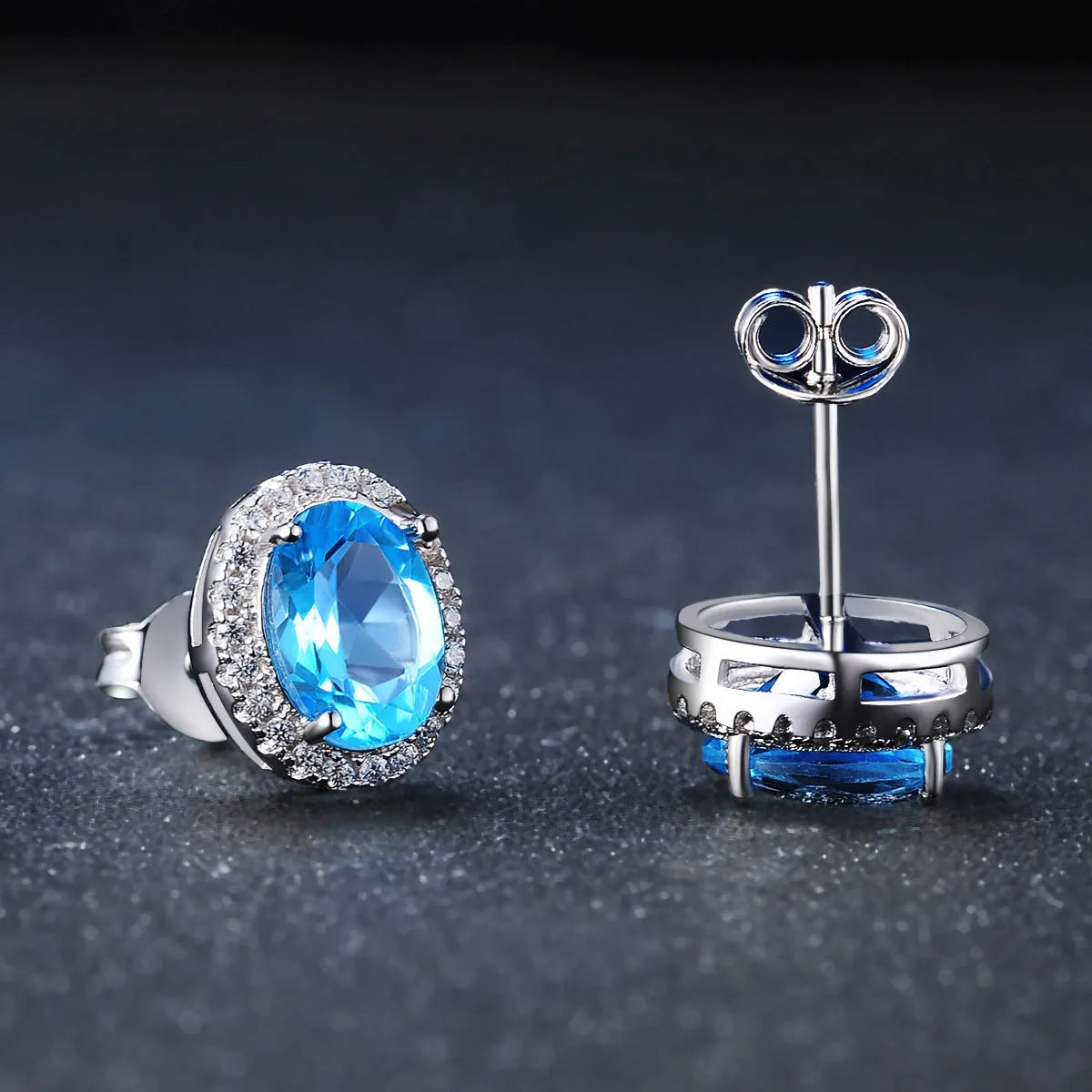 925 sterling silver blue topaz geometric jewellery set with earrings, ring, necklace, and pendant