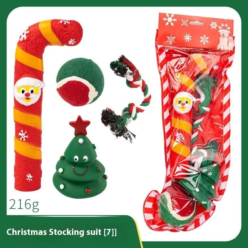 Set of colourful Christmas-themed vinyl dog chew toys including balls, ropes, and Santa figures.