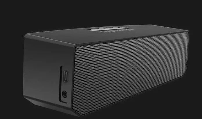 Black rectangular BS-6 cloud smart speaker with Bluetooth connectivity on desktop