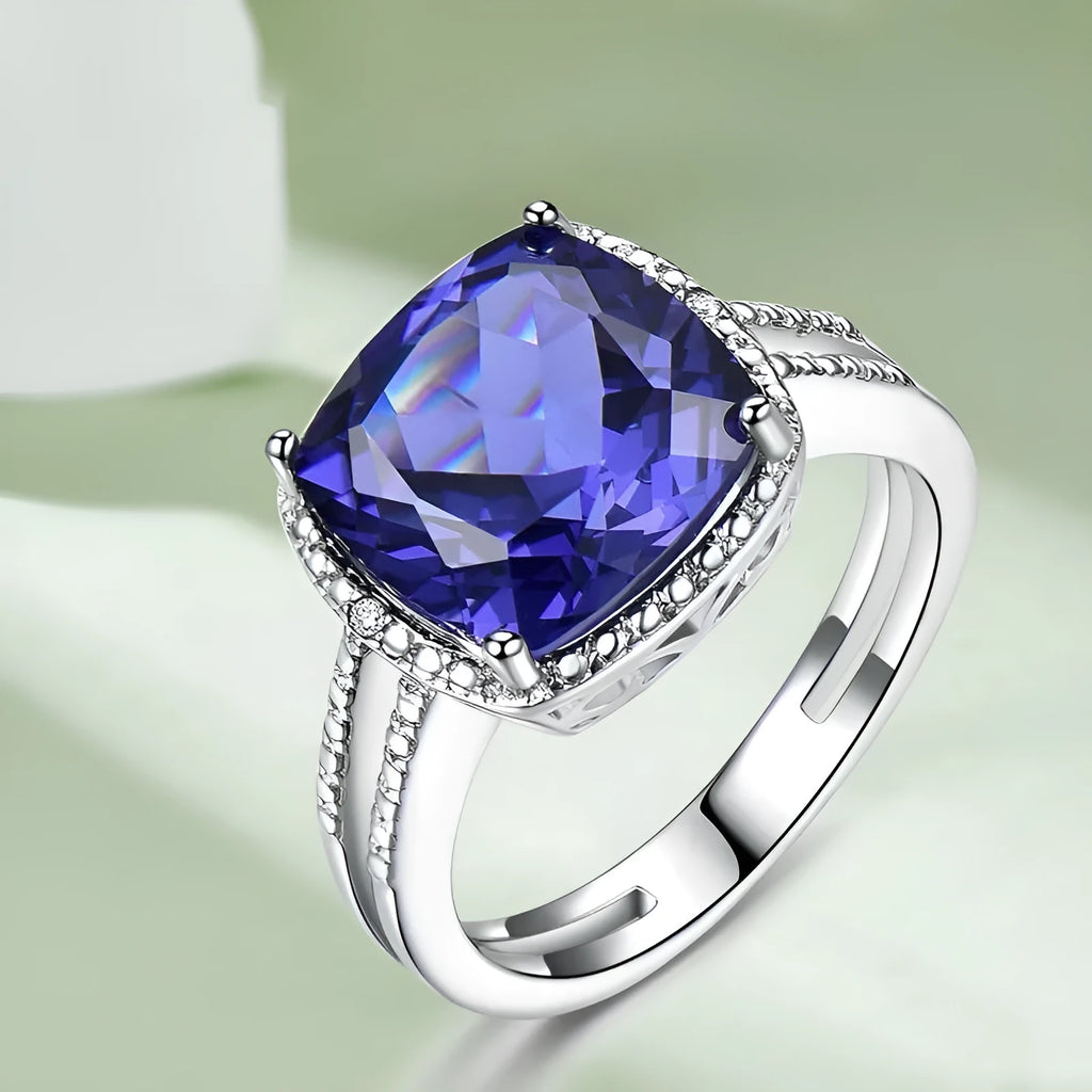 Women's sterling silver ring with a genuine blue tanzanite gemstone, shown in size 8.