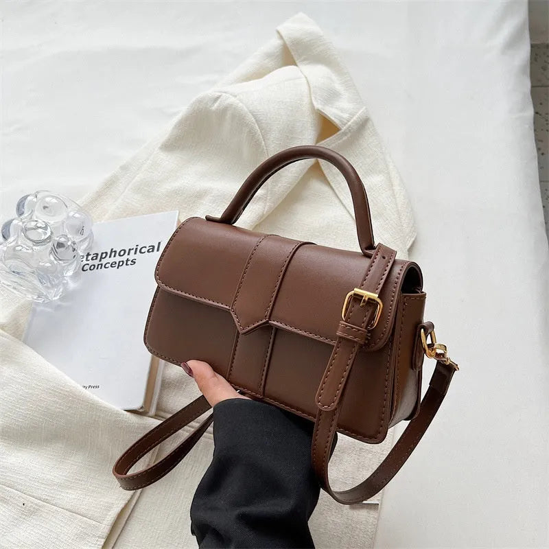 Women's PU messenger bag in horizontal square shape with sandwich pocket and file organiser interior