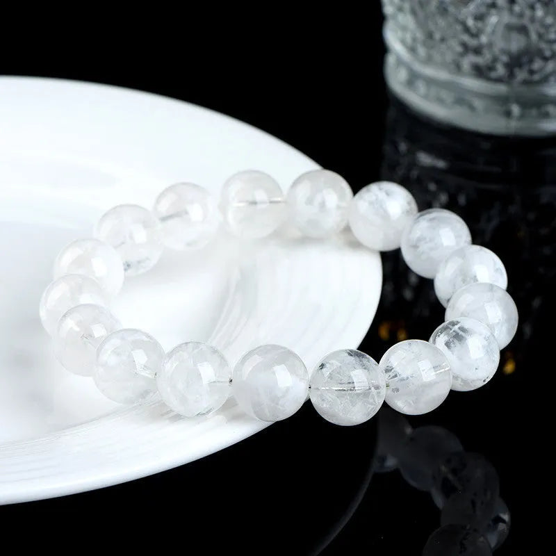 Natural blizzard snowflake round crystal bead women's bracelet with Ruyi and Xiangyun design.