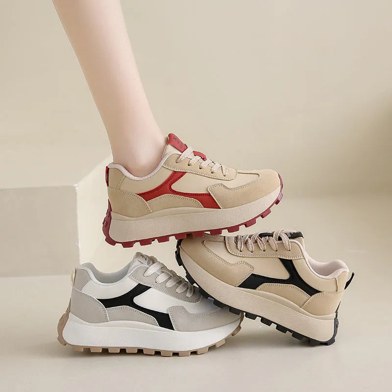 Women's low-top platform sports shoes in solid colours with lace-up front and mesh lining.