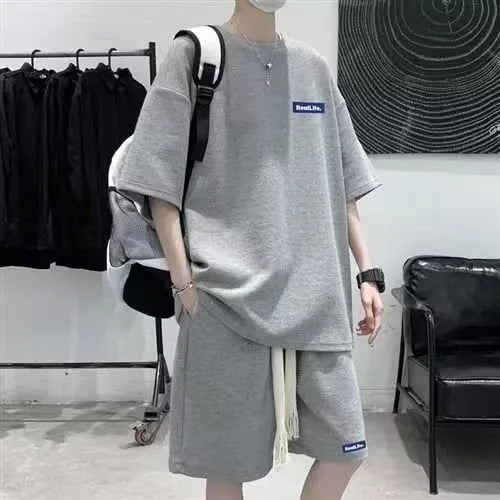 Men's waffle textured leisure sports suit set with short sleeves and shorts in grey