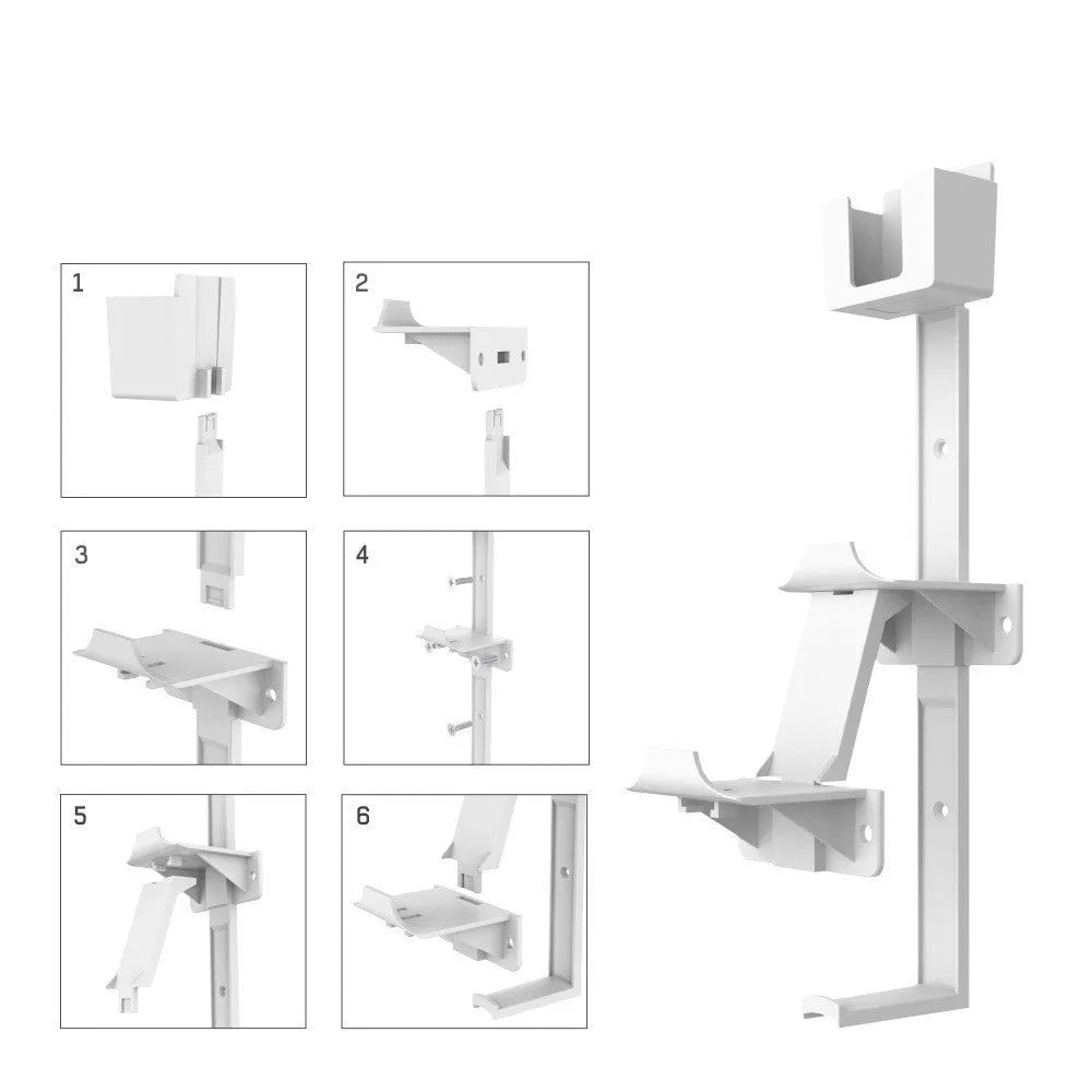 White wall-mounted hook holding PlayStation controller and headphones
