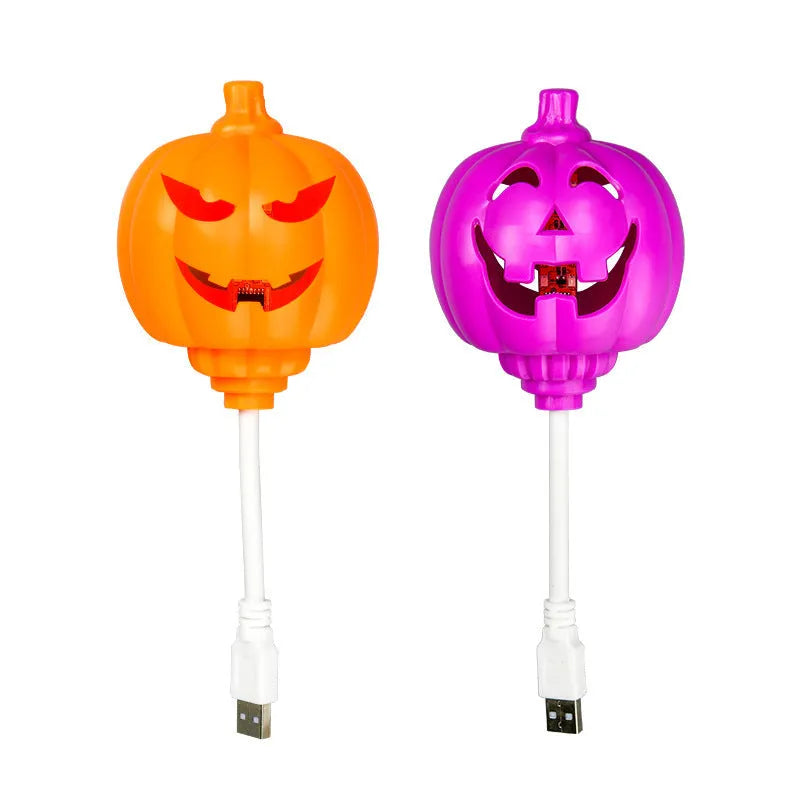 Plastic pumpkin decorative lamp with USB charging cable and yellow or purple light options