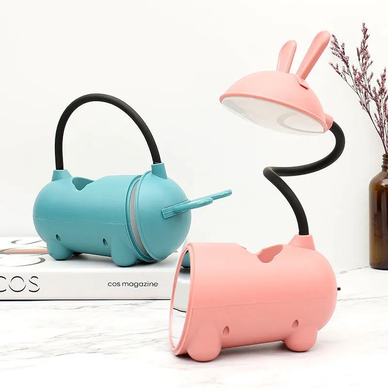 Green cartoon desk lamp with USB cable and pen storage compartment