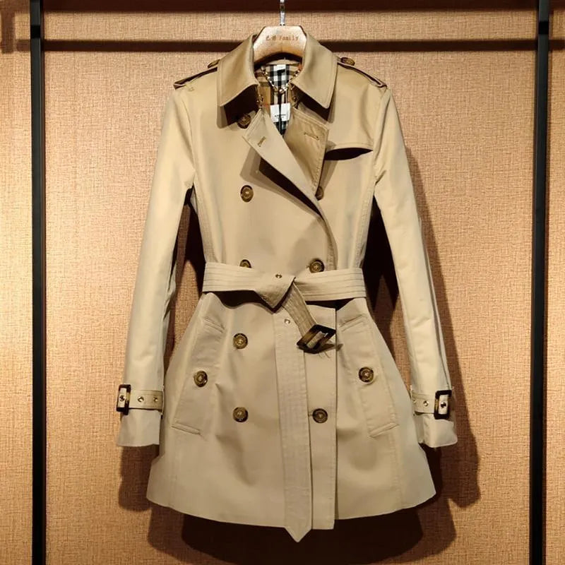 Khaki women's trench coat with double-breasted button front and flight sleeves