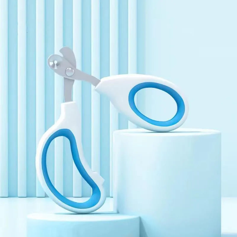 Blue pet nail clippers with circular safety hole and cushioned non-slip handle for trimming cat and bird nails.