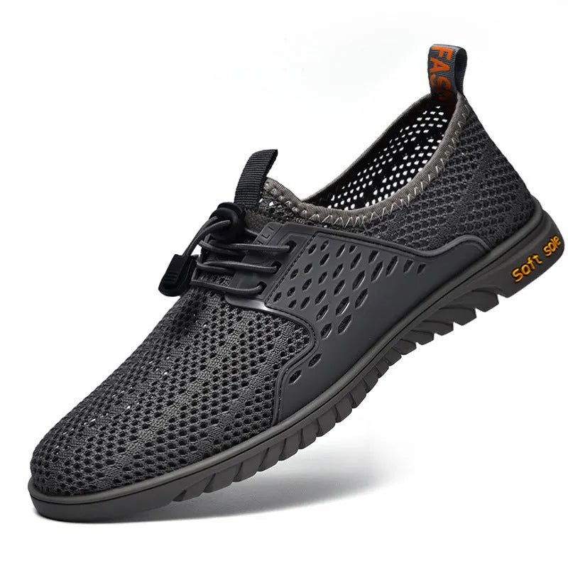 Men's black breathable mesh casual shoes with elastic band and rubber sole.