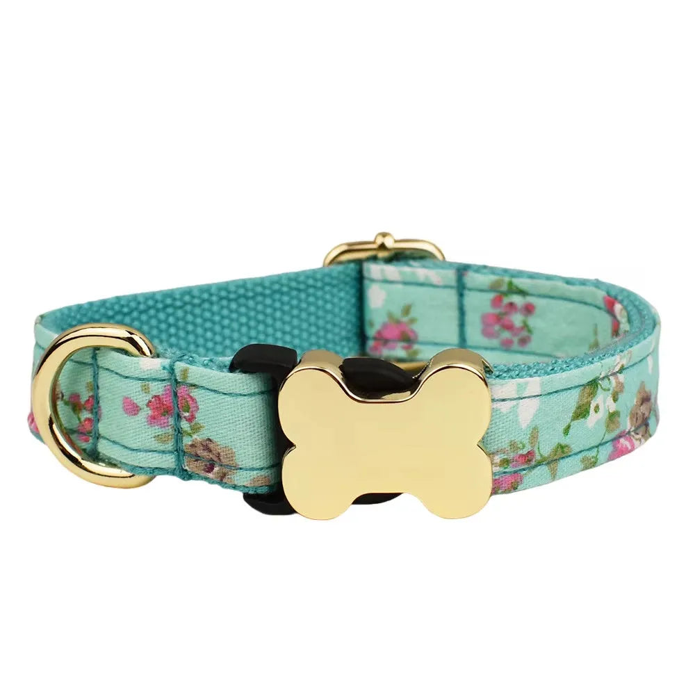 Nylon dog collar with printed grid pattern and a bone-shaped metal buckle in a selected colour.
