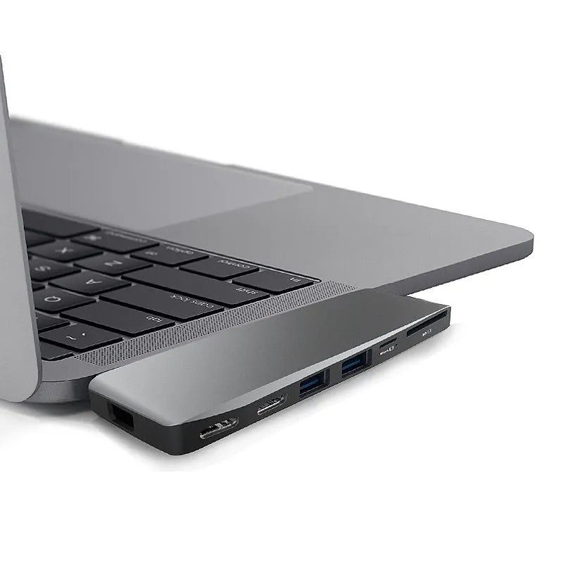 USB-C hub adapter for MacBook Pro with eight ports including HDMI, USB 3.0, SD/TF card reader, and PD charging