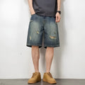 Blue retro denim men's shorts with distressed holes and straight leg cut