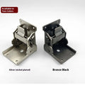 Close-up of a self-locking furniture folding hinge in an electroplated finish, set at a 90-degree angle.