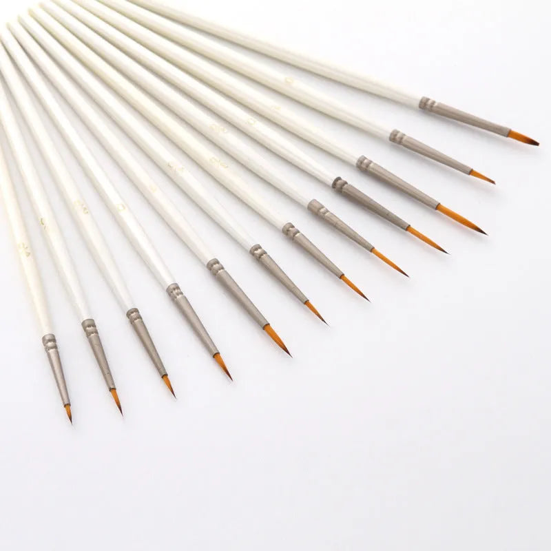 Twelve pearl white fluorescent marker pens with nylon wool brushes and wood holders for watercolour and acrylic painting