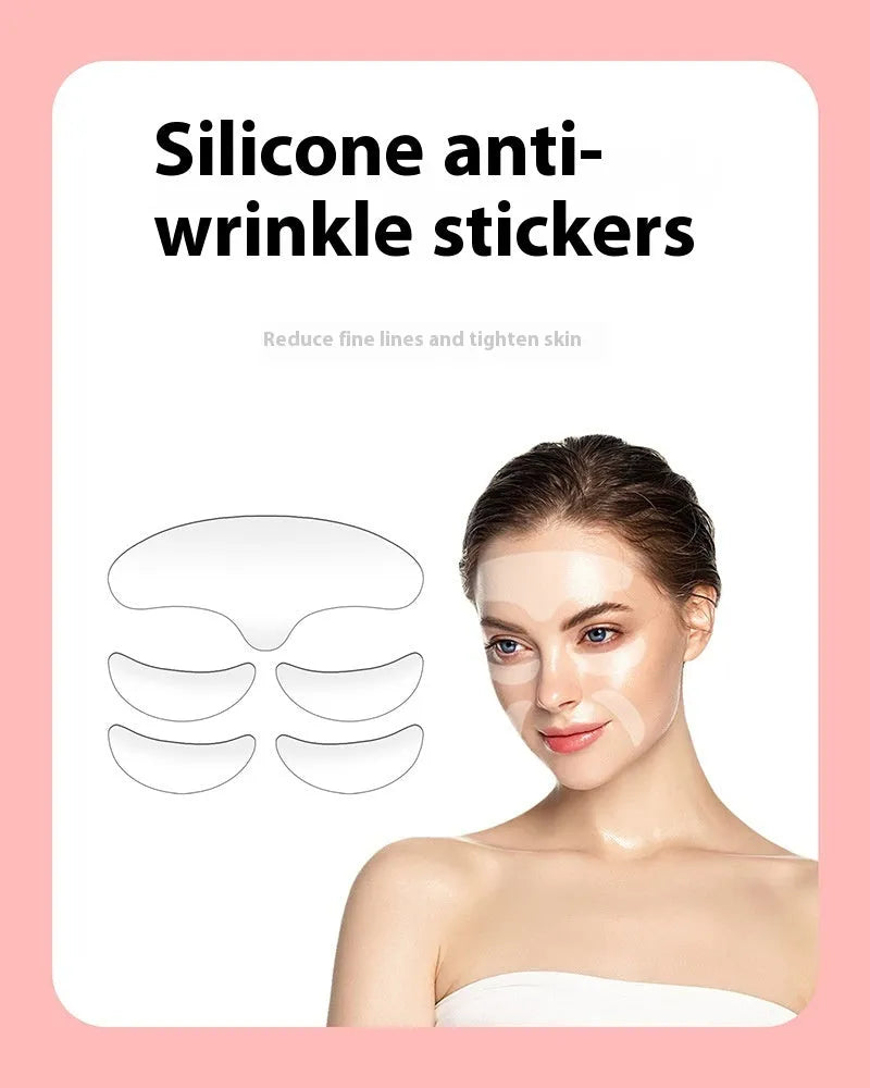 Five transparent silicone anti-wrinkle face stickers laid flat