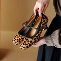 Women's black square toe stiletto heel ankle-strap shoes with horse hair upper and buckle closure