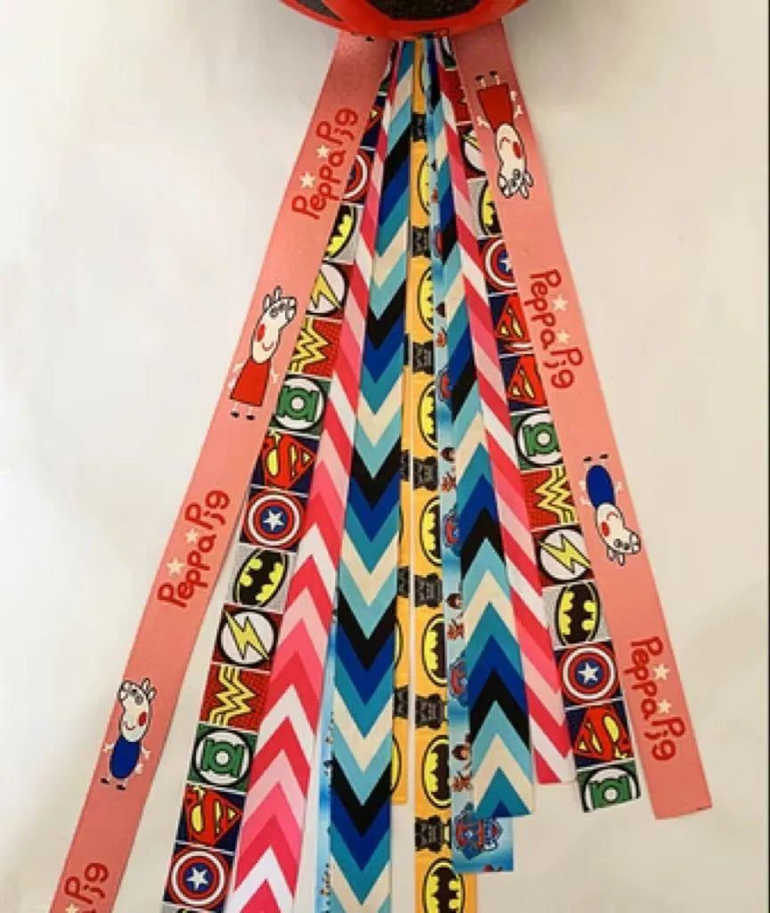 Children's decorative helmet streamer ribbon in multiple colours for roller skating and skiing safety gear.