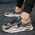 Men's gray and black mesh running shoes with a round toe and middle-top design on a white background.