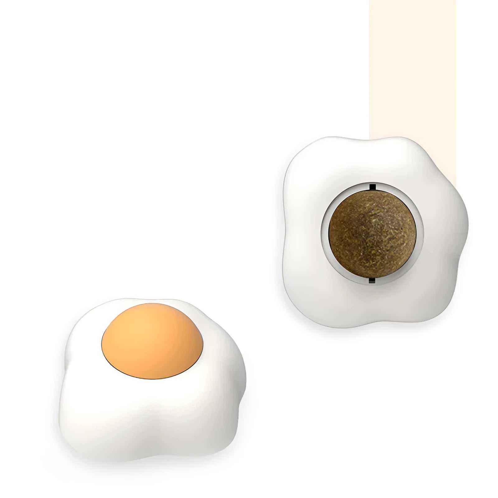 Soft plush catnip ball toy attached to wall for interactive feline play