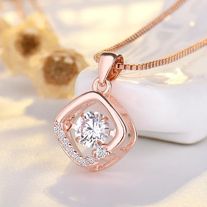 Sterling silver plated heart necklace pendant with crown and bow details in rose gold or silver colour