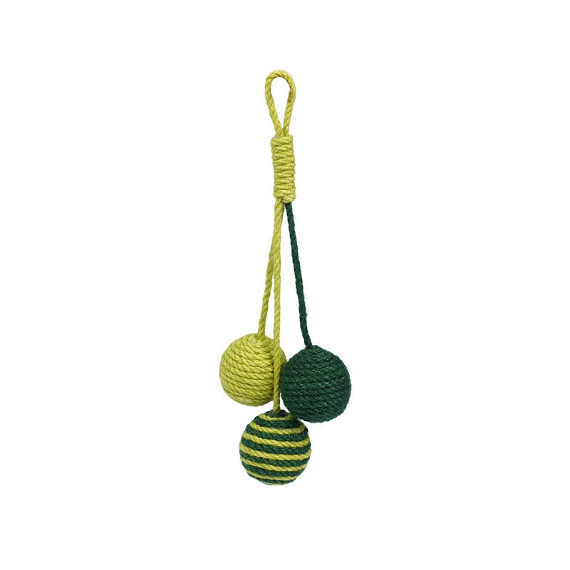 Set of three cat toys: a teaser stick, a catnip ball, and a self-play wand on a blue background.