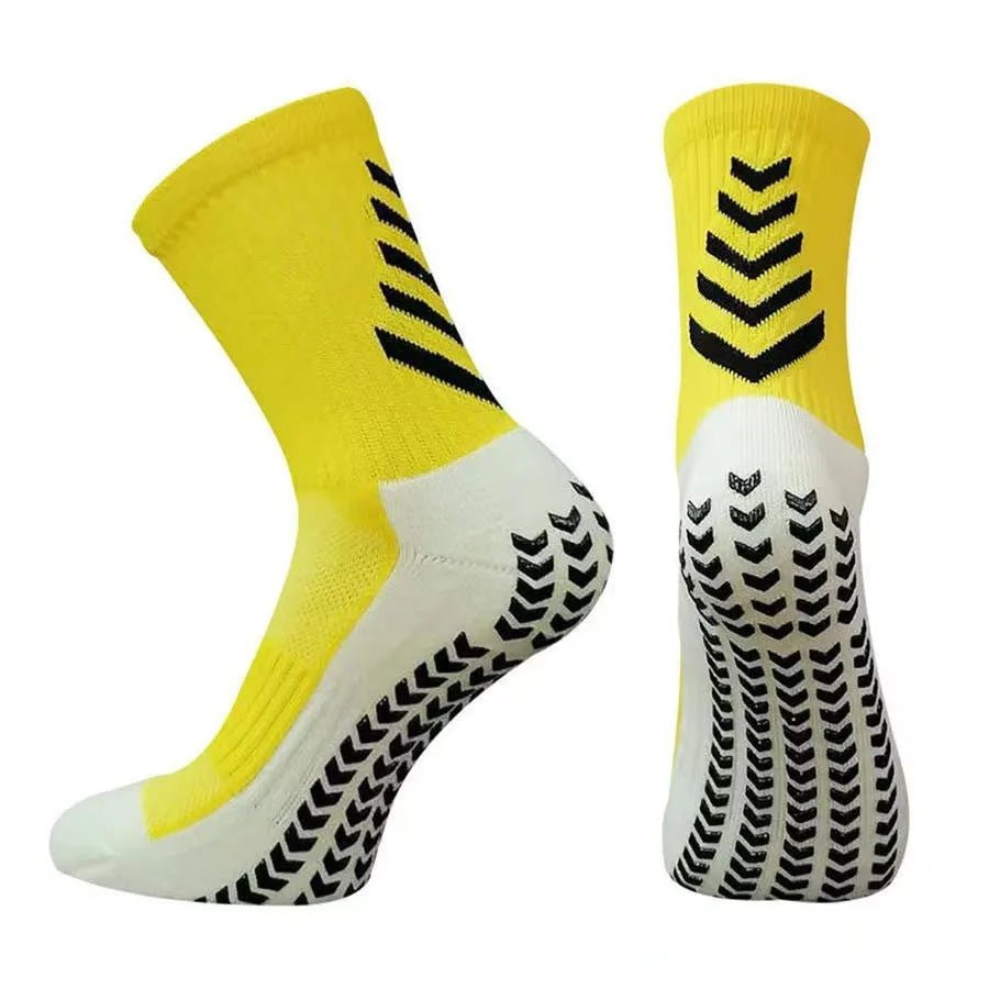 Men's mid-calf athletic socks with geometric patterns and non-slip silicone grip for football and running