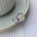 Copper vintage ring with imitation white chalcedony stone and adjustable open-mouth design