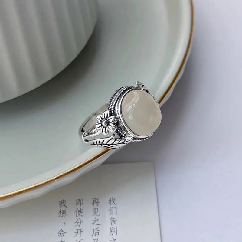 Copper vintage ring with imitation white chalcedony stone and adjustable open-mouth design