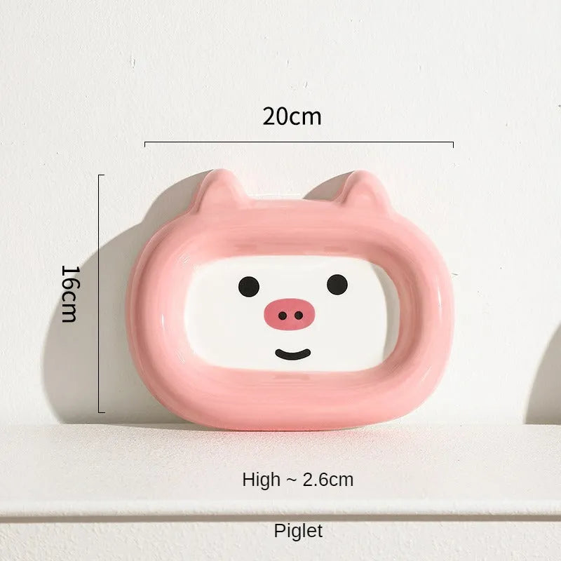 Ceramic pet bowl with animal design, 13.5cm diameter, for cat and small dog food or water.