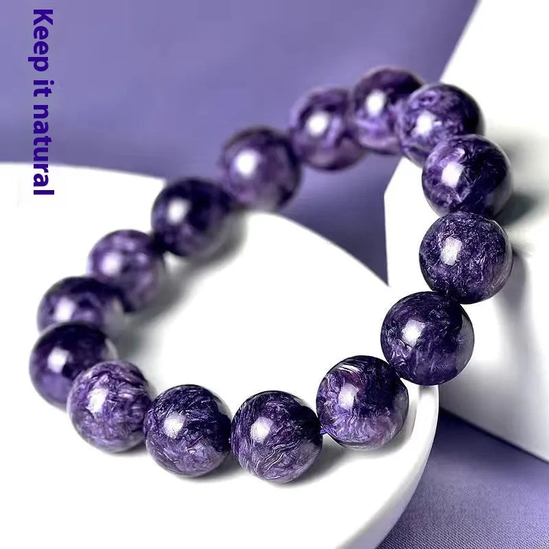 Natural transparent charoite crystal bracelet with platinum elements in four bead sizes