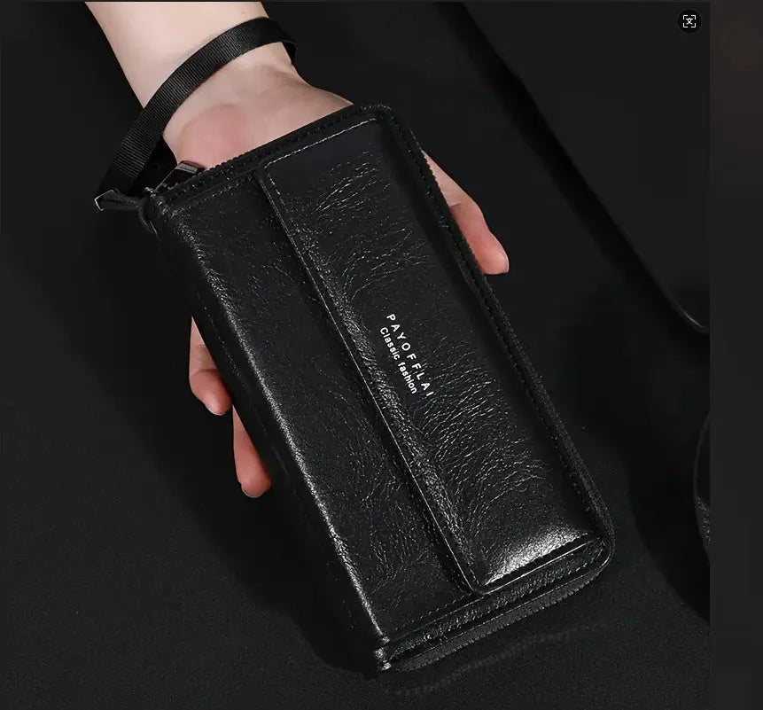 Men's black PU leather long wallet showing multiple card slots and note compartment.