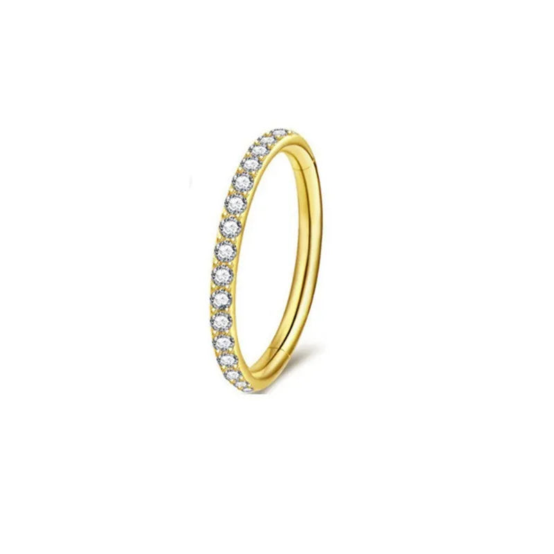A seamless stainless steel nose ring hoop showing gold and rose gold electroplated colour options.