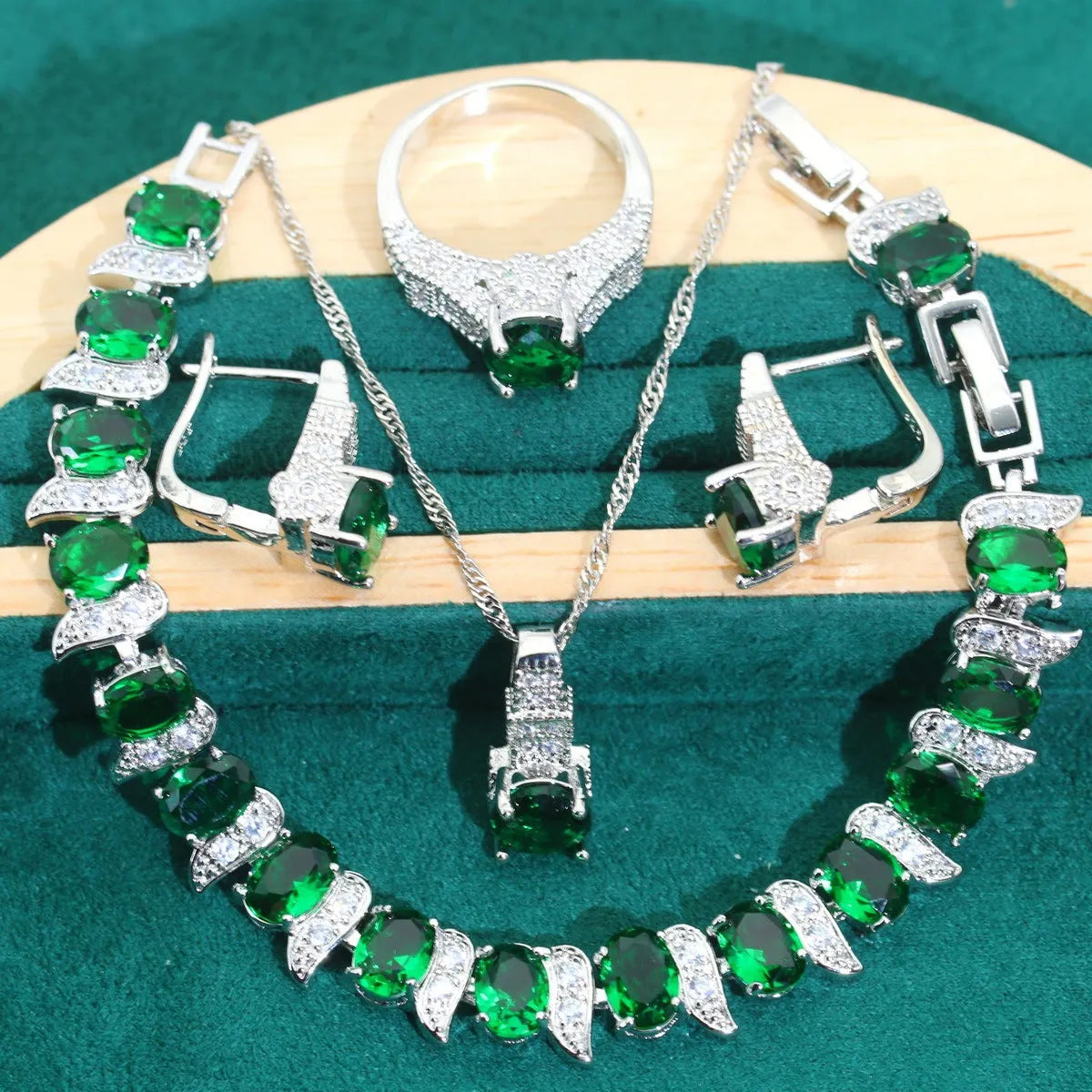 Four-piece bridal jewellery set with necklace, bracelet, earrings, and ring in alloy with zircon detail