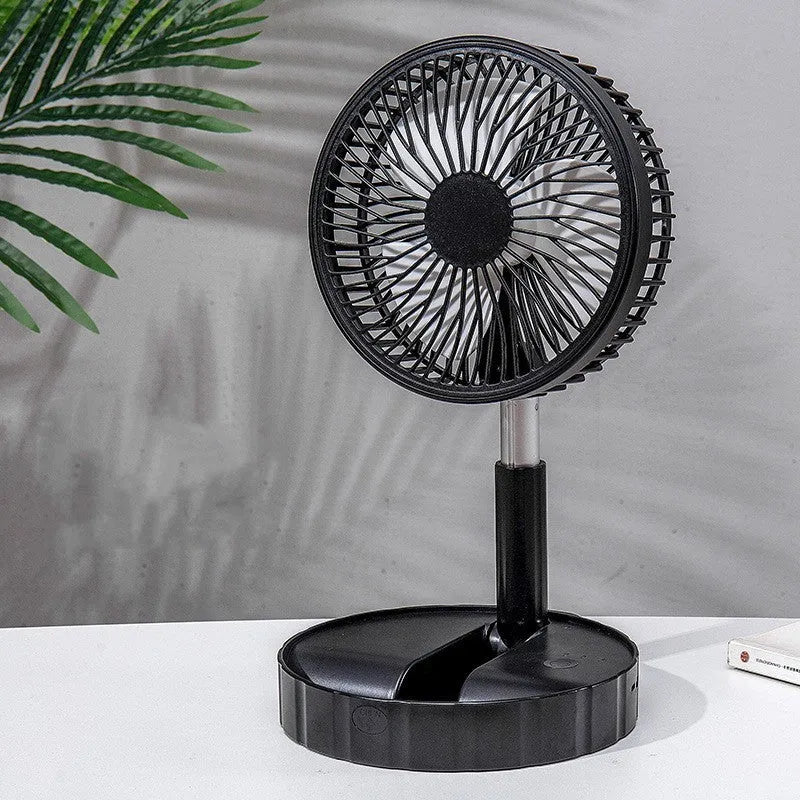 Black portable telescopic folding fan extended to full height showing ABS plastic body and aluminium alloy stand