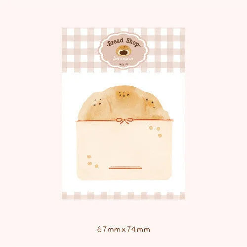 Food bread themed notebook showing compact 85x120mm dimensions with 30 sheets of 80g paper