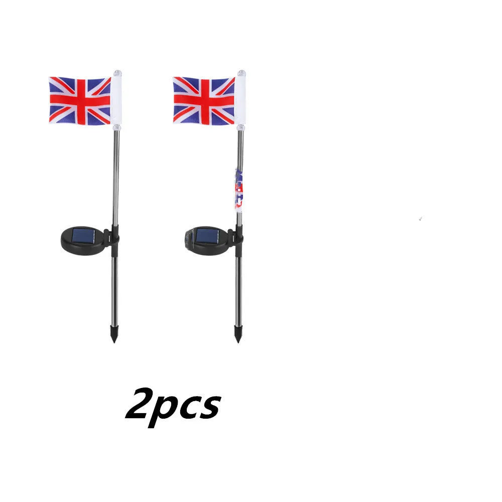 Solar garden flag light with stainless steel pole showing either American or British flag design.