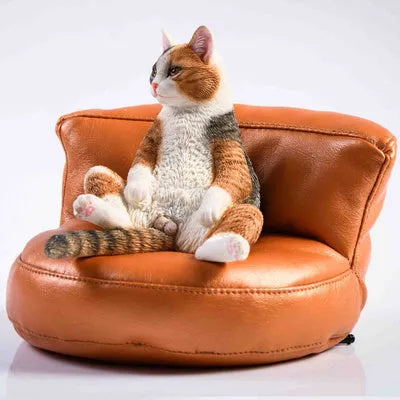 Lazy cat resin car dashboard ornament with sofa, 7.5cm tall