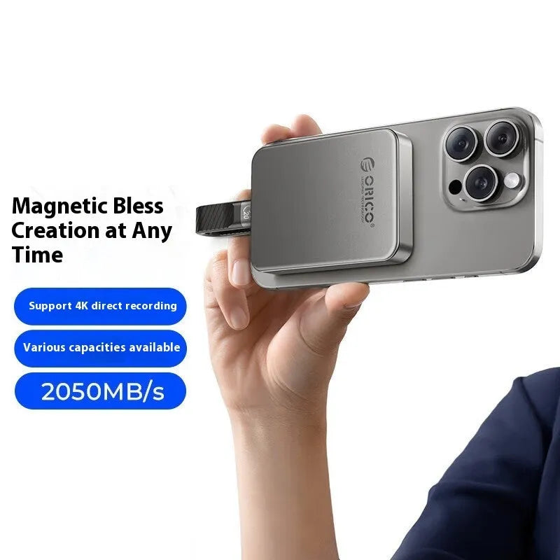 Grey magnetic mobile solid state drive with ultra-thin profile and magnetic suction ring for portable storage