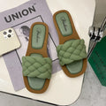Women's plaid pattern PVC sandals with thick non-slip sole in black, on a white background.