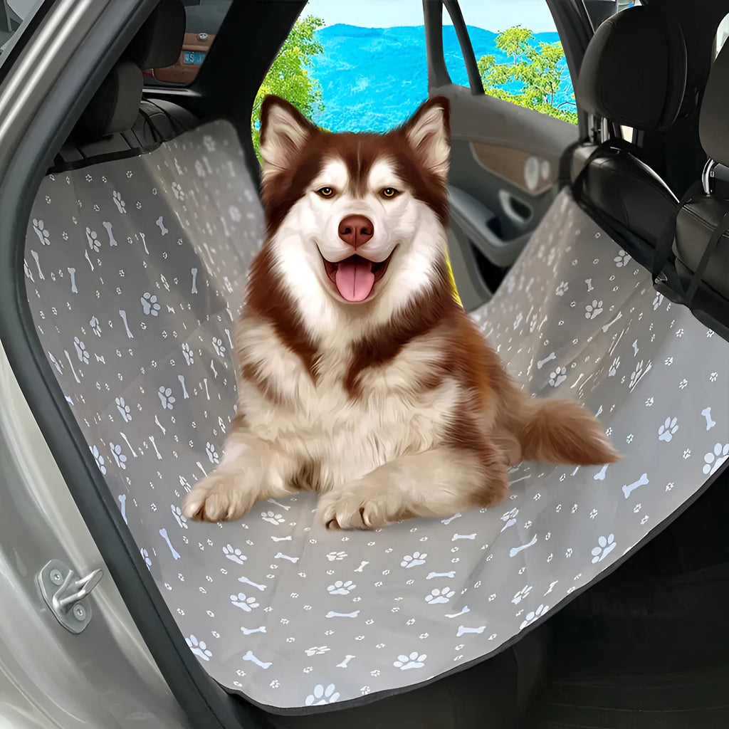 Dog car seat protector mat on rear bench seats in grey dog footprints pattern