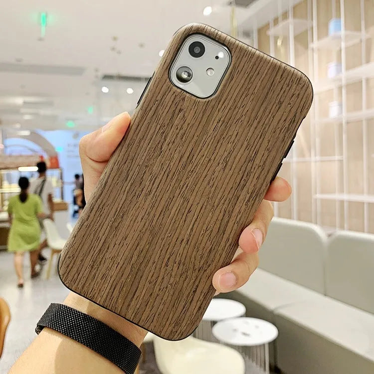 Natural wood iPhone case in back cover style showing timber grain patterns