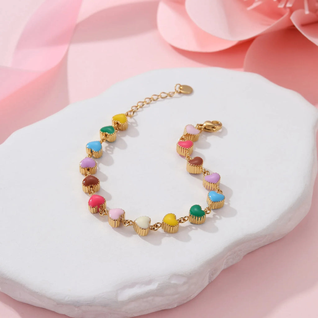 Love heart-shaped stainless steel bracelet with colourful oil titanium electroplated finish in gold colour