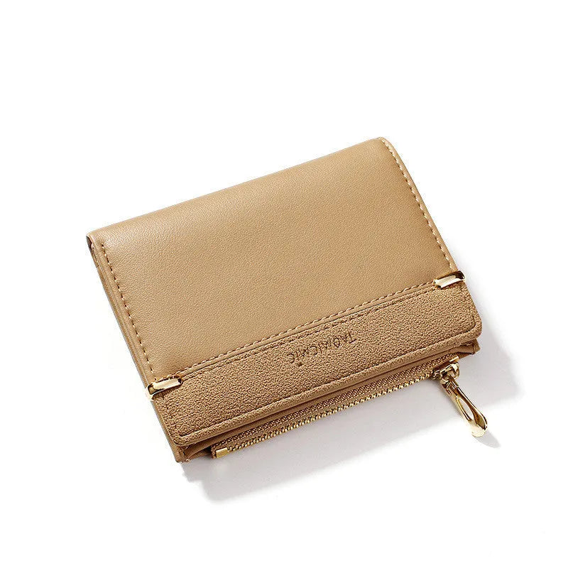 A two-fold PU leather ladies wallet with a zipper, shown in multiple colours, displaying internal card slots and compartments.