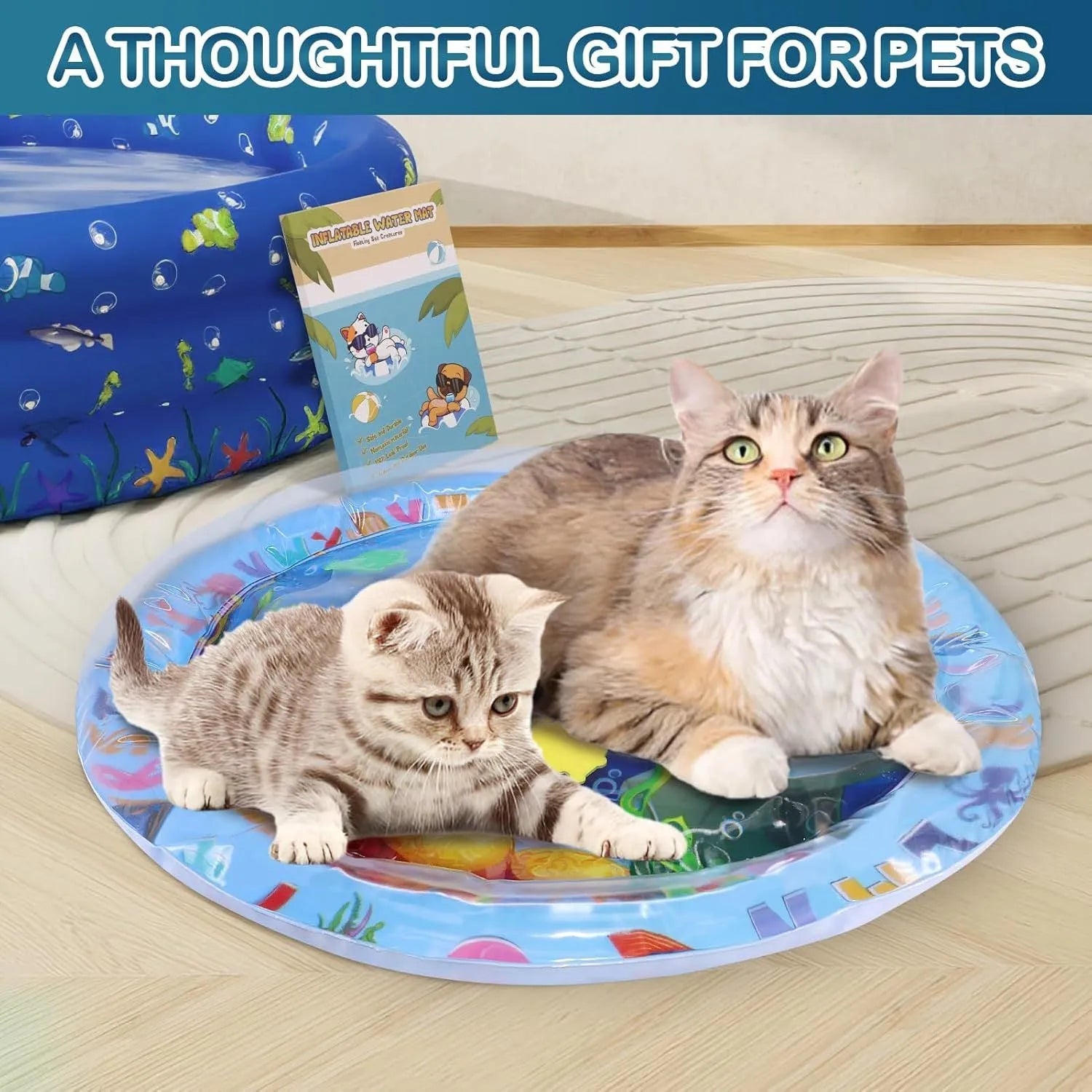 Square cat water playmat with ocean fish design and floating toys on blue PVC surface