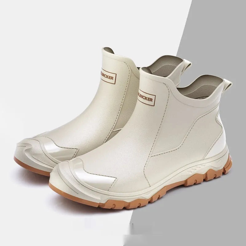 Short tube PVC wading shoe covers with round toe and non-slip plastic sole in solid colour.
