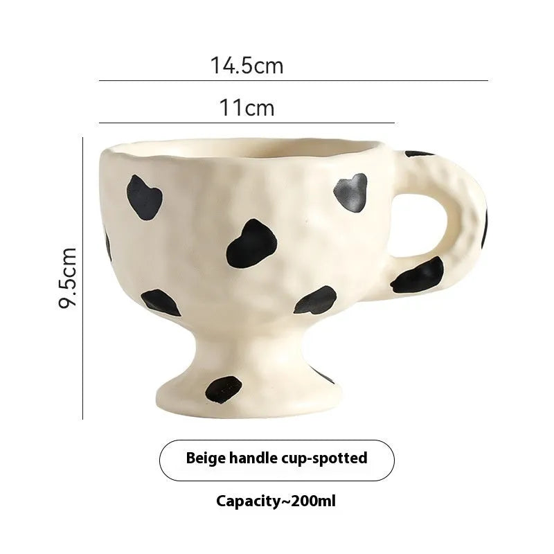 Hand-pinched irregular ceramic mug in solid colour with modern simple style, shown from side angle