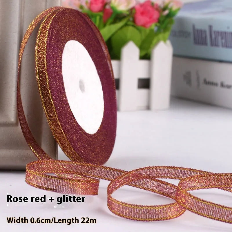 Roll of narrow 0.6cm wide polyester satin ribbon in a choice of colours, showing 22 metre length.