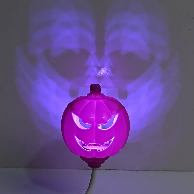 Plastic pumpkin decorative lamp with USB charging cable and yellow or purple light options