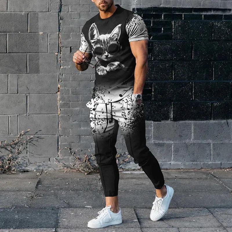 Man wearing a printed short-sleeve t-shirt and matching trousers from a cotton-like men's tracksuit set.